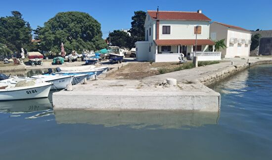 Završeni radovi na sanaciji obalnog zida u luci Olib vrijednosti preko 650.000kn